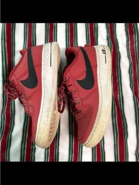 Nike Red Low-Top Sneakers with Black Swoosh